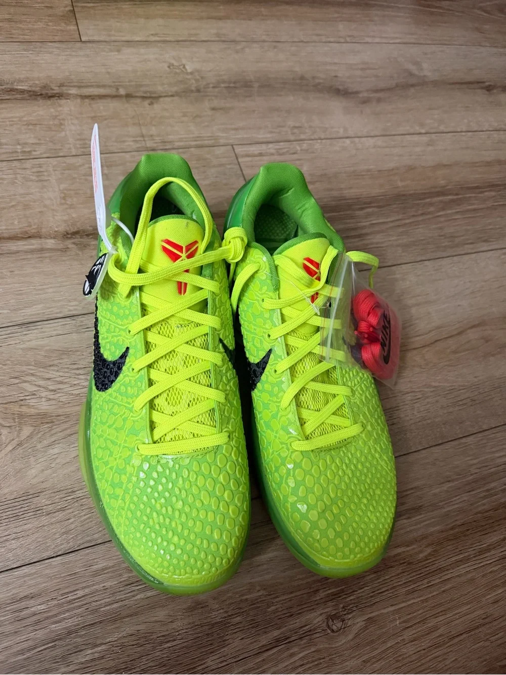 Nike Kids Bright Neon Green Athletic Sneakers with Extra Red Laces its new